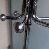 Chrome metal parrot coat holder from the 70s