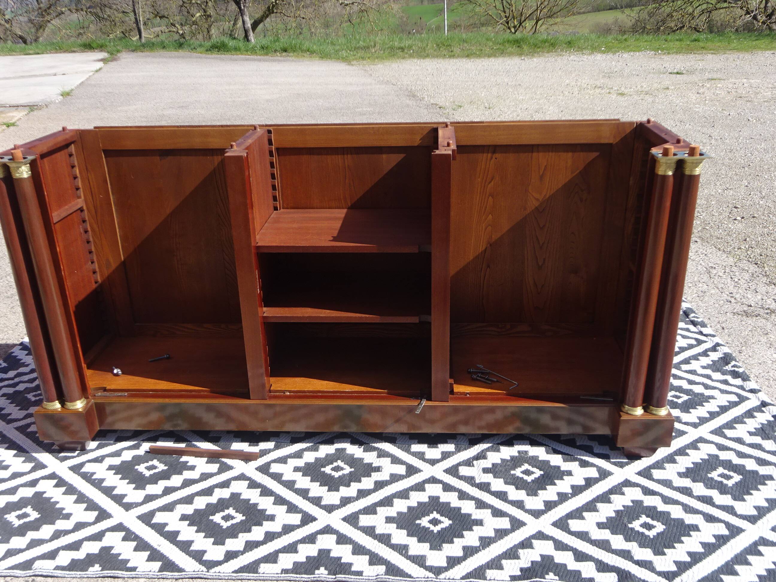 Flamed mahogany enfilade with sea green marble in Empire style.