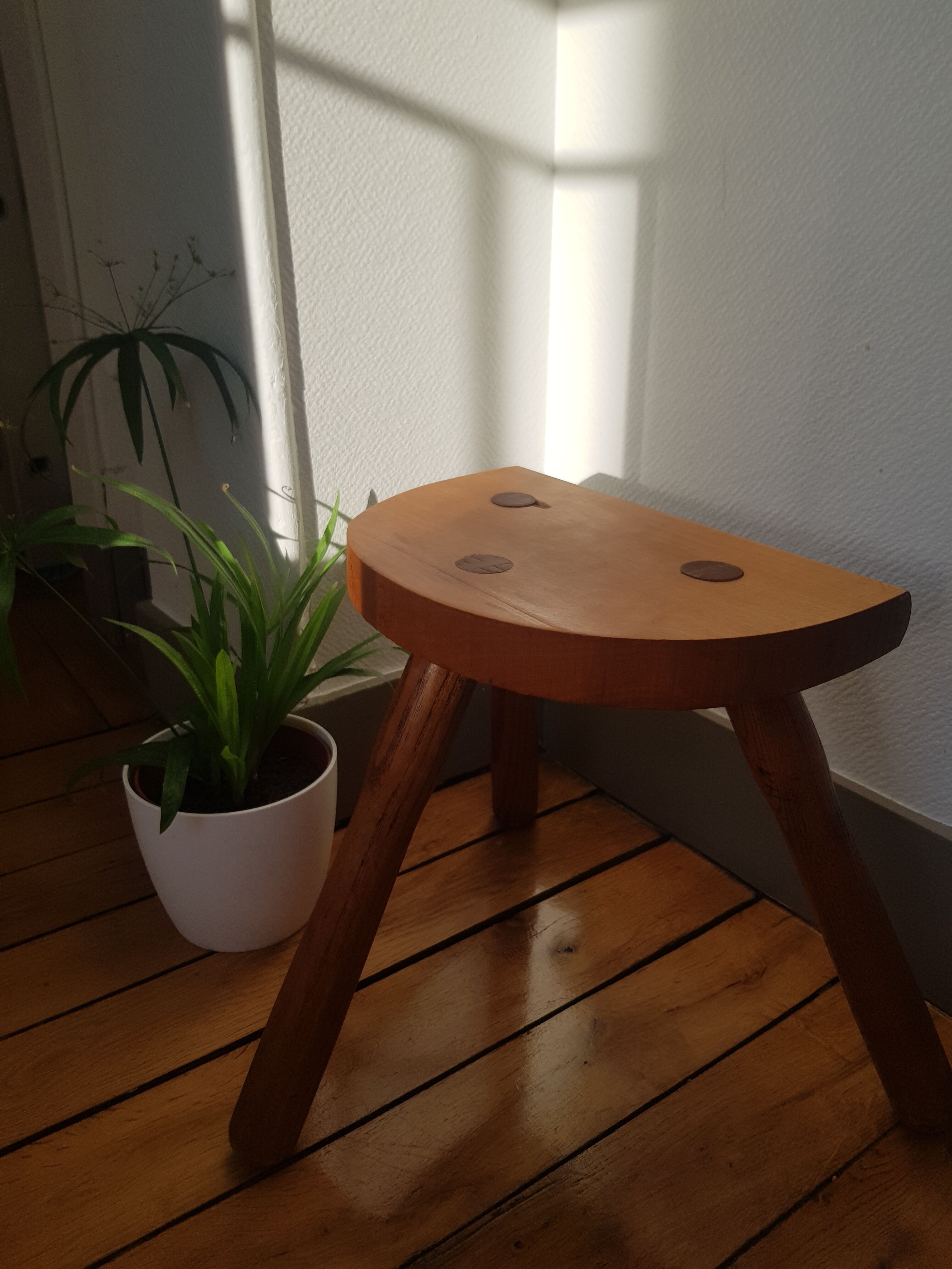 Massive wooden tripod stool