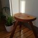 Massive wooden tripod stool