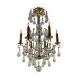 Gilded bronze chandelier trimmed with drop-shaped stamps
