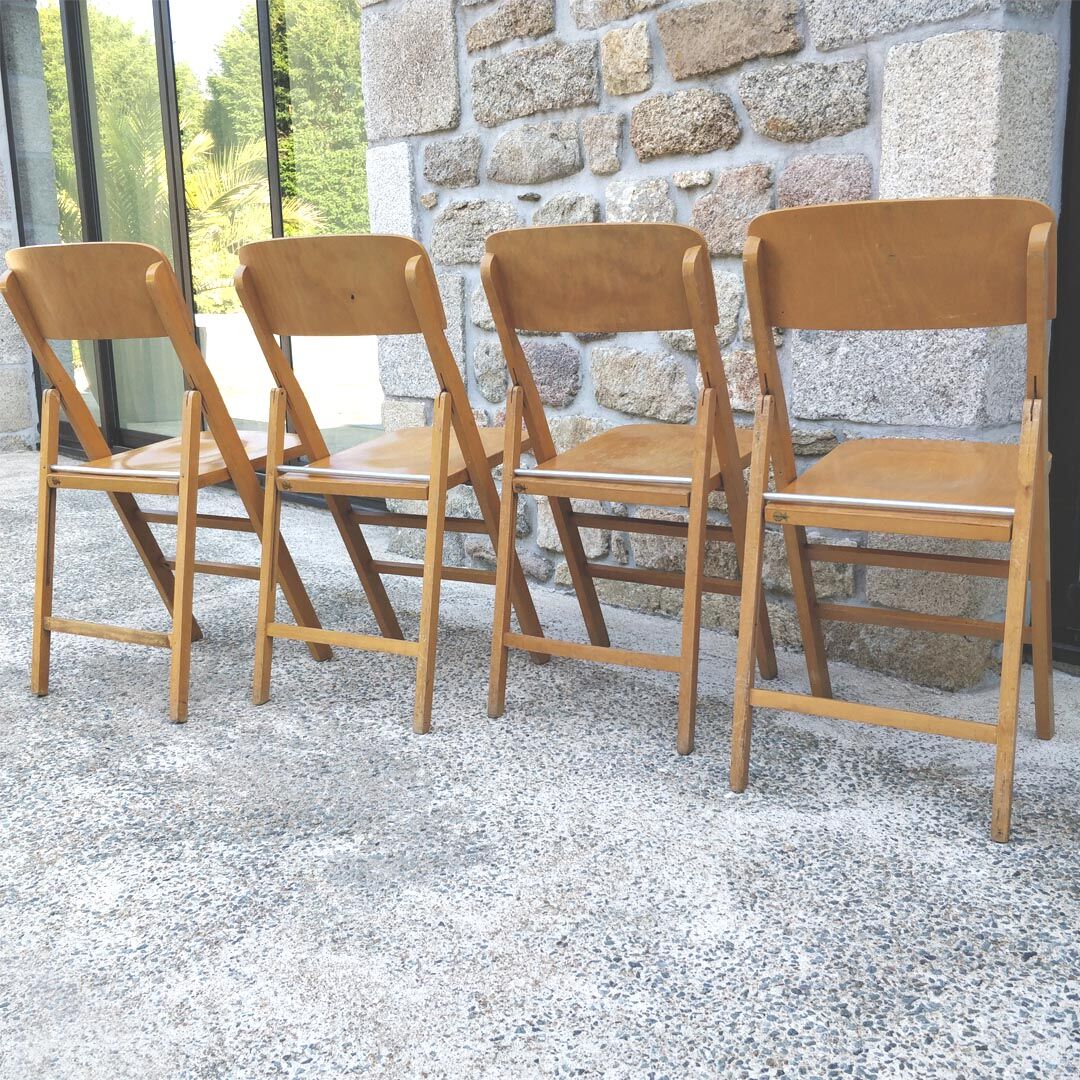 Four 60s wooden Stella chairs