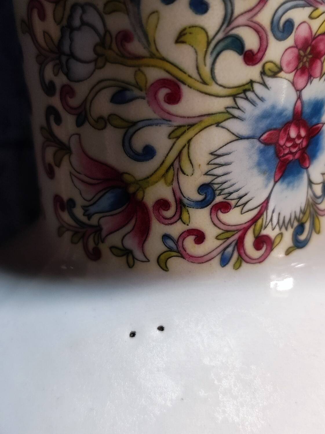 Porcelain peacock vase