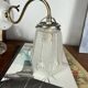 Vintage brass wall light with Art Nouveau tulip shade.