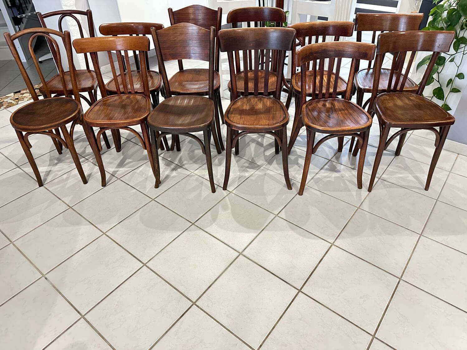 Set of 12 mismatched bistro chairs Baumann & Fischel 1930