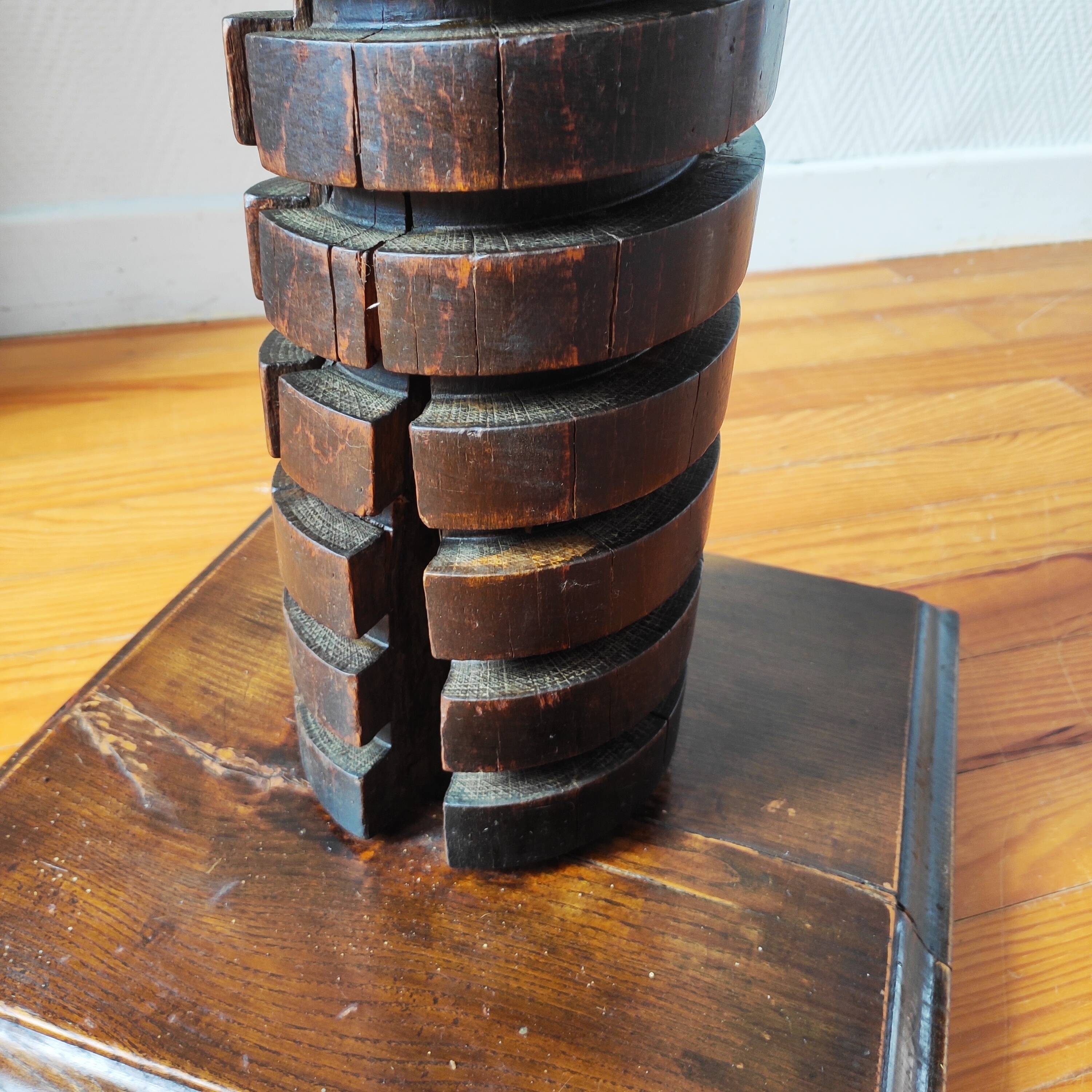 Brutalist column – old Burgundy press screw