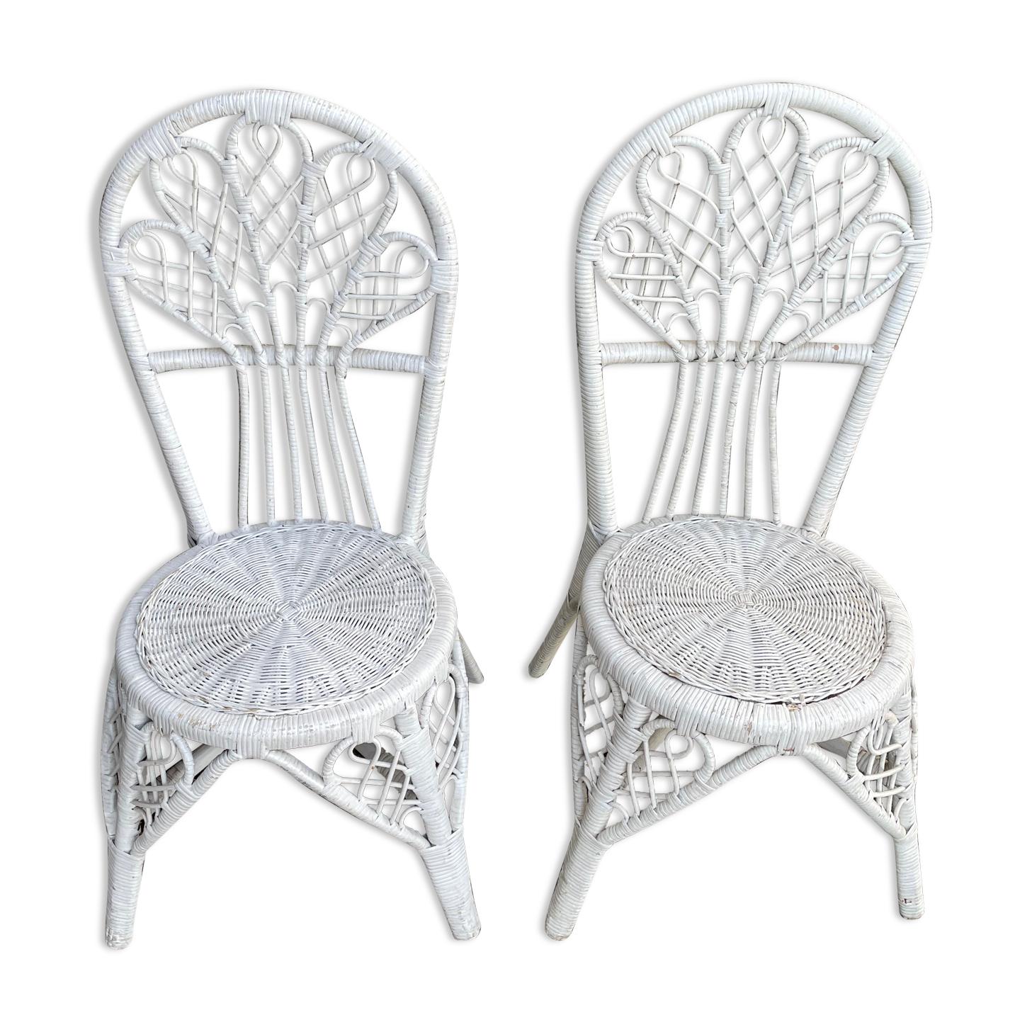Pair of white peacock rattan chairs, circa 1960