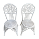 Pair of white peacock rattan chairs, circa 1960