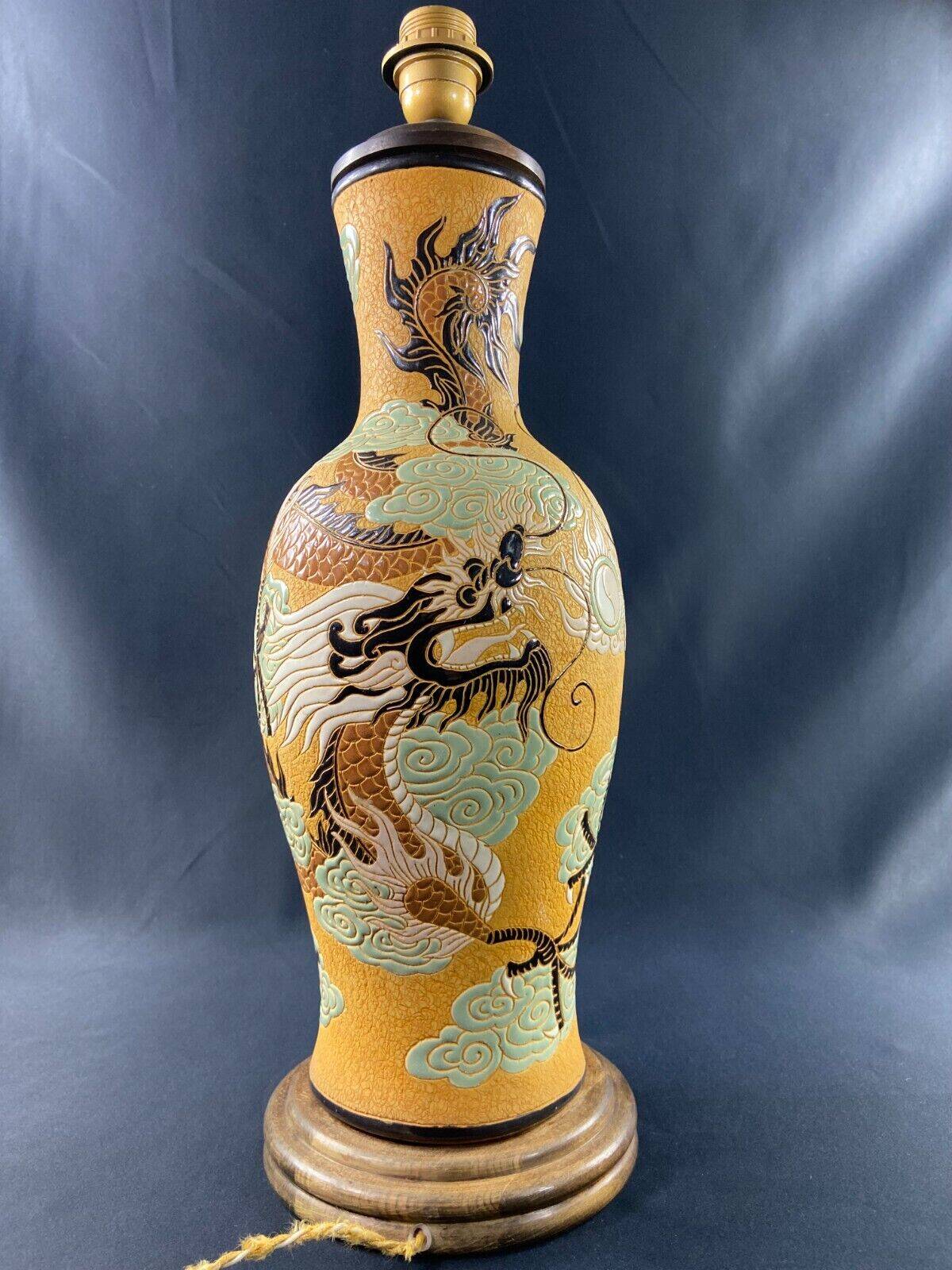 Very large dragon lamp on a yellow background in well-fired Vietnamese stoneware.