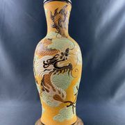 Very large dragon lamp on a yellow background in well-fired Vietnamese stoneware.