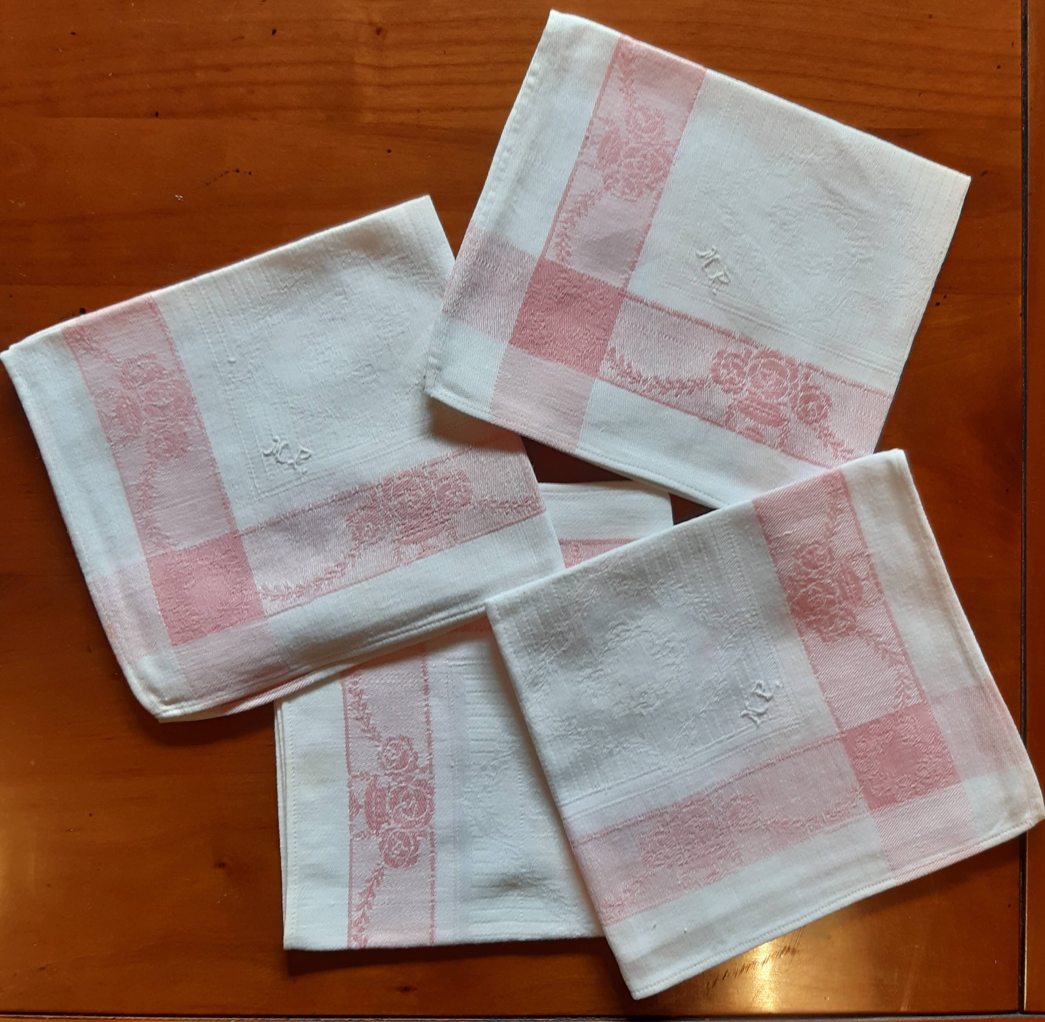 4 embroidered napkins on thread, tea service. Pink trim. Initials M.P.