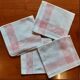 4 embroidered napkins on thread, tea service. Pink trim. Initials M.P.