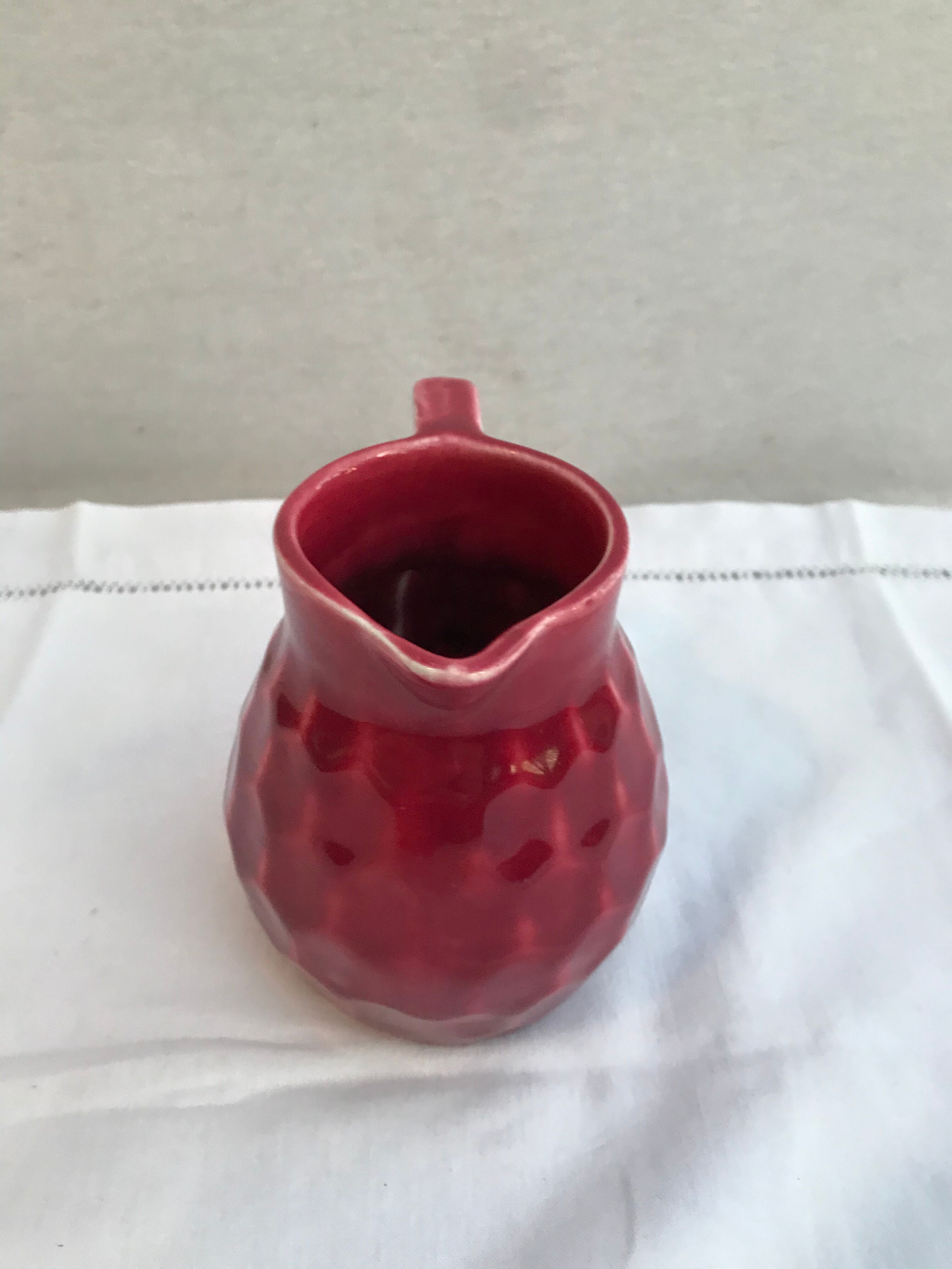 Former art deco red ceramics pitcher