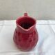 Former art deco red ceramics pitcher