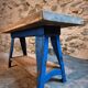 Vintage industrial workbench table with cast iron legs (Aux Forges de Vulcain)
