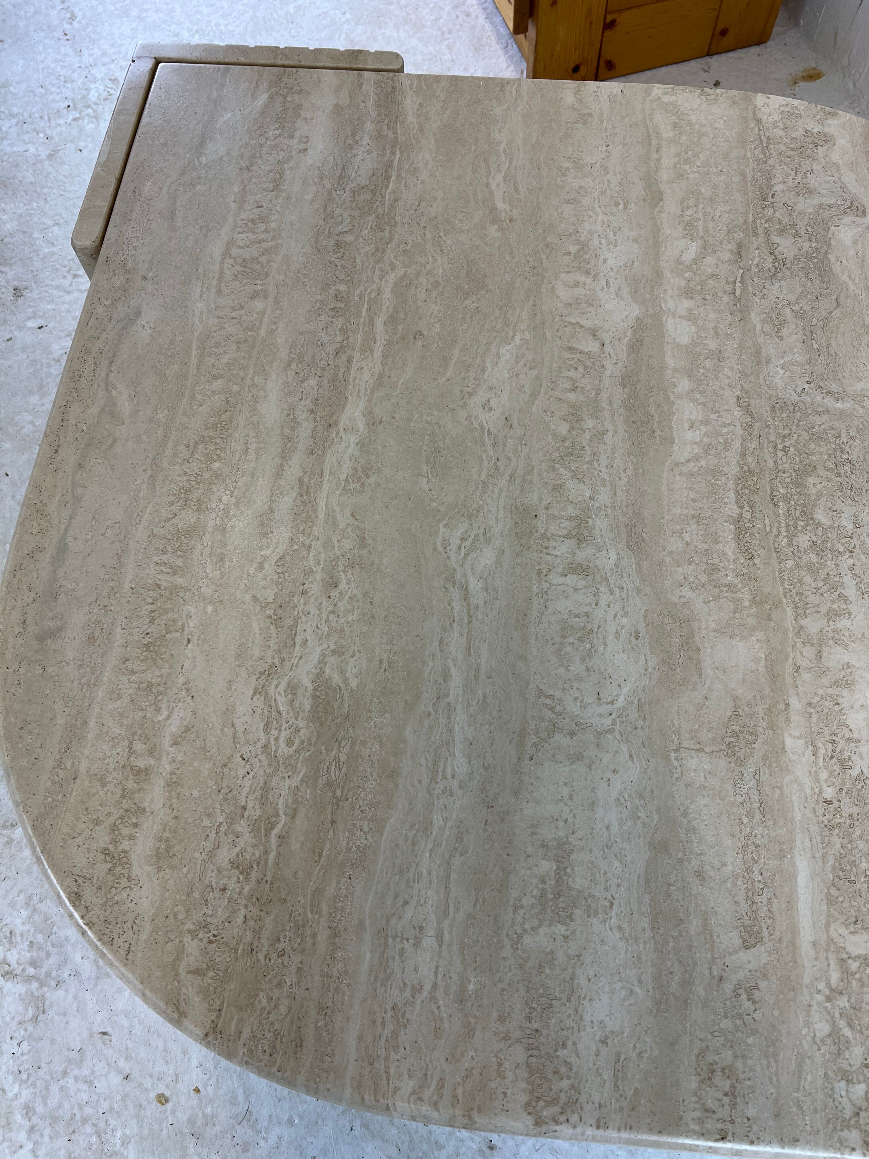 Coffee table Roche Bobois "eye" in travertine, 1970