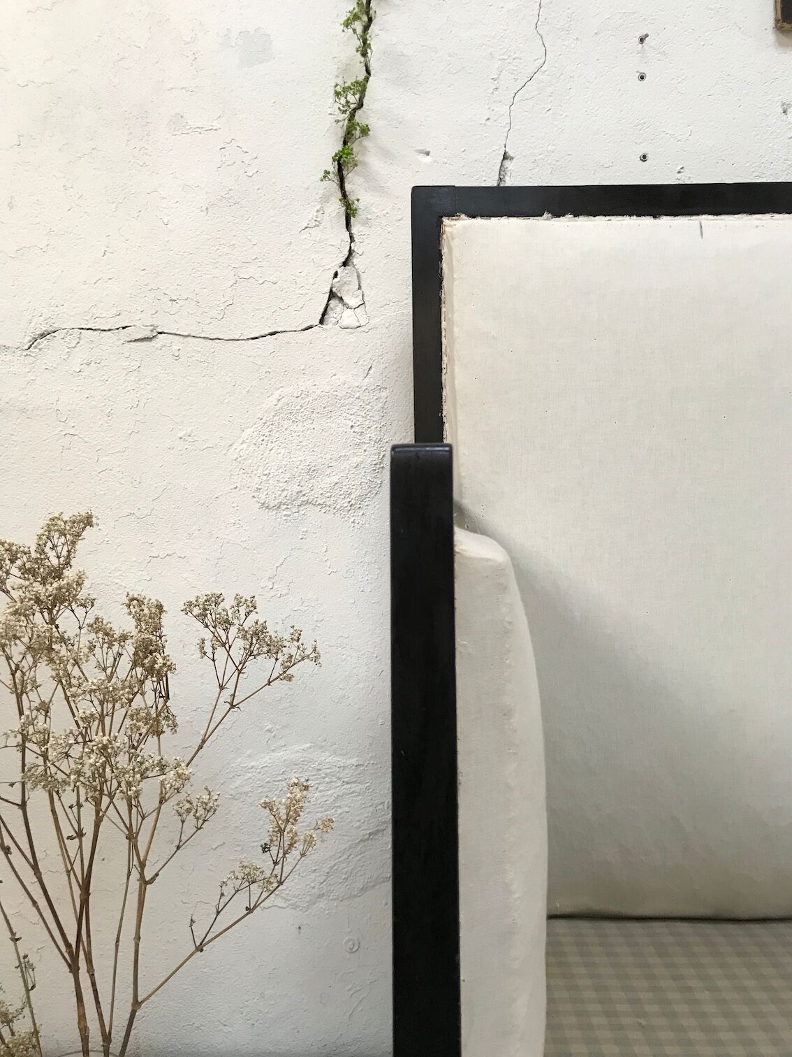 Pair of blackened wooden armchairs