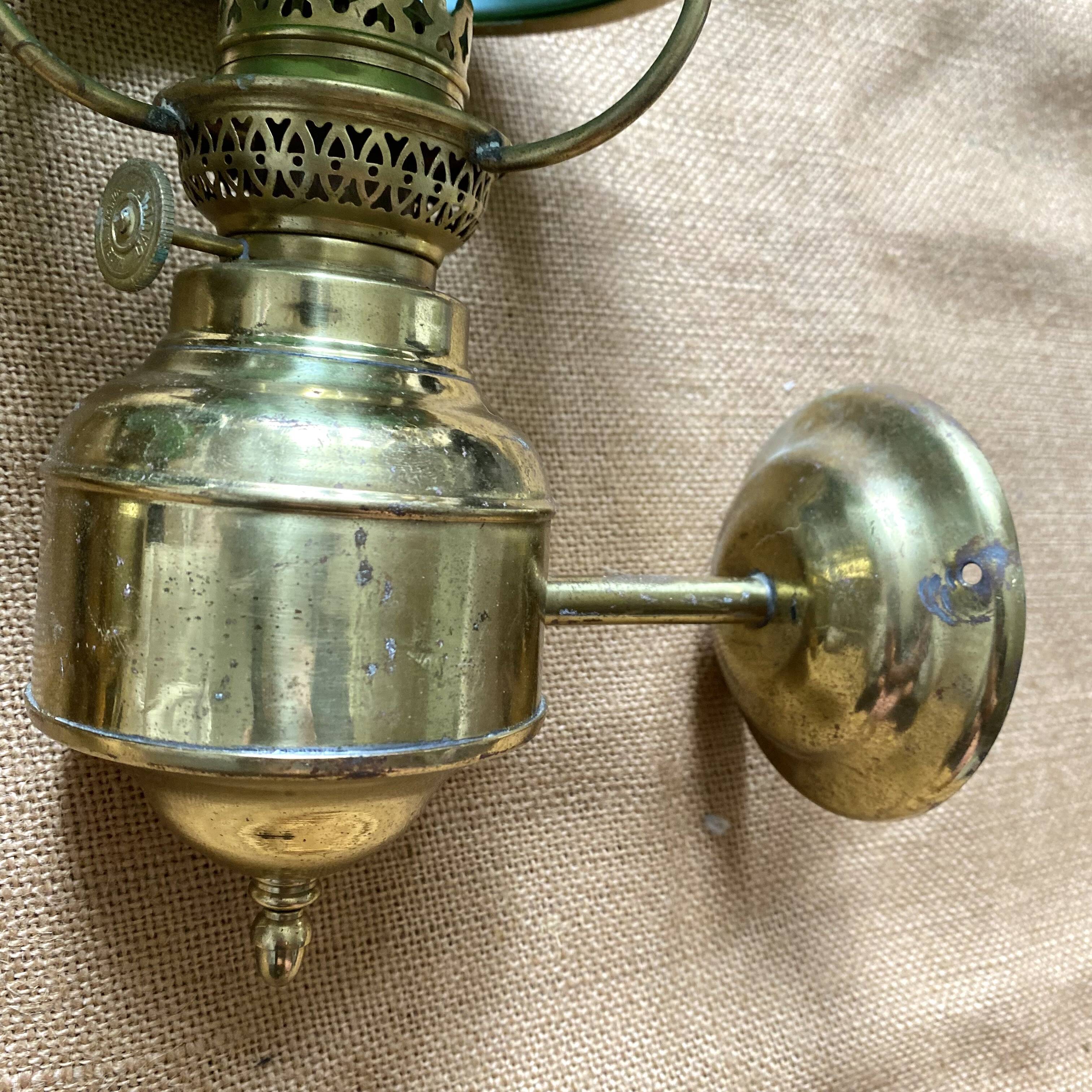 Pair of opaline and brass wall lights