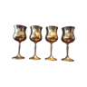 4 glasses of brass wines