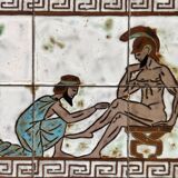 Vintage magazine table with Greek mythology motif.