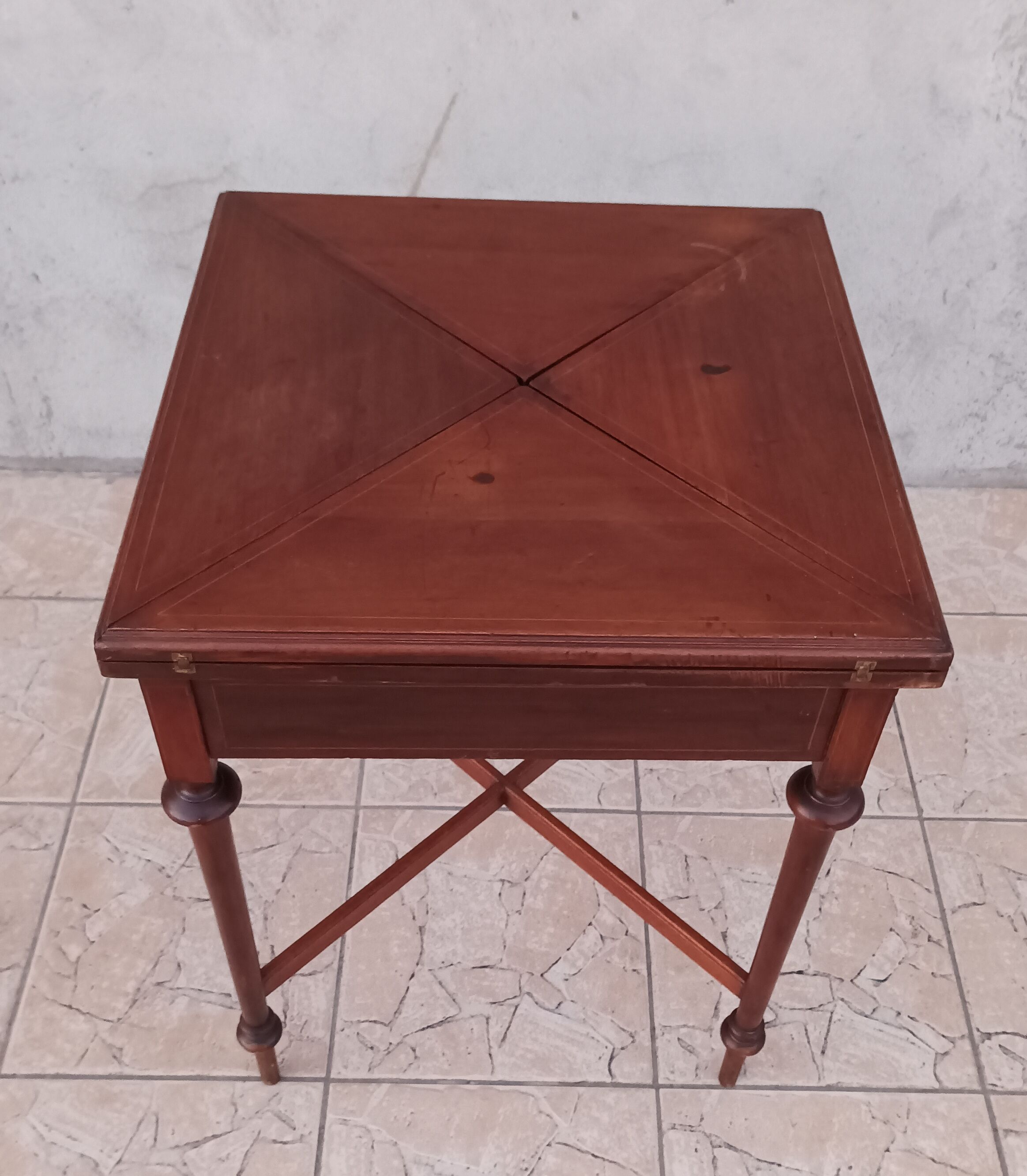 Game table in mahogany late 19th