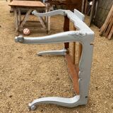 Louis XV style walnut table with a natural wood top.