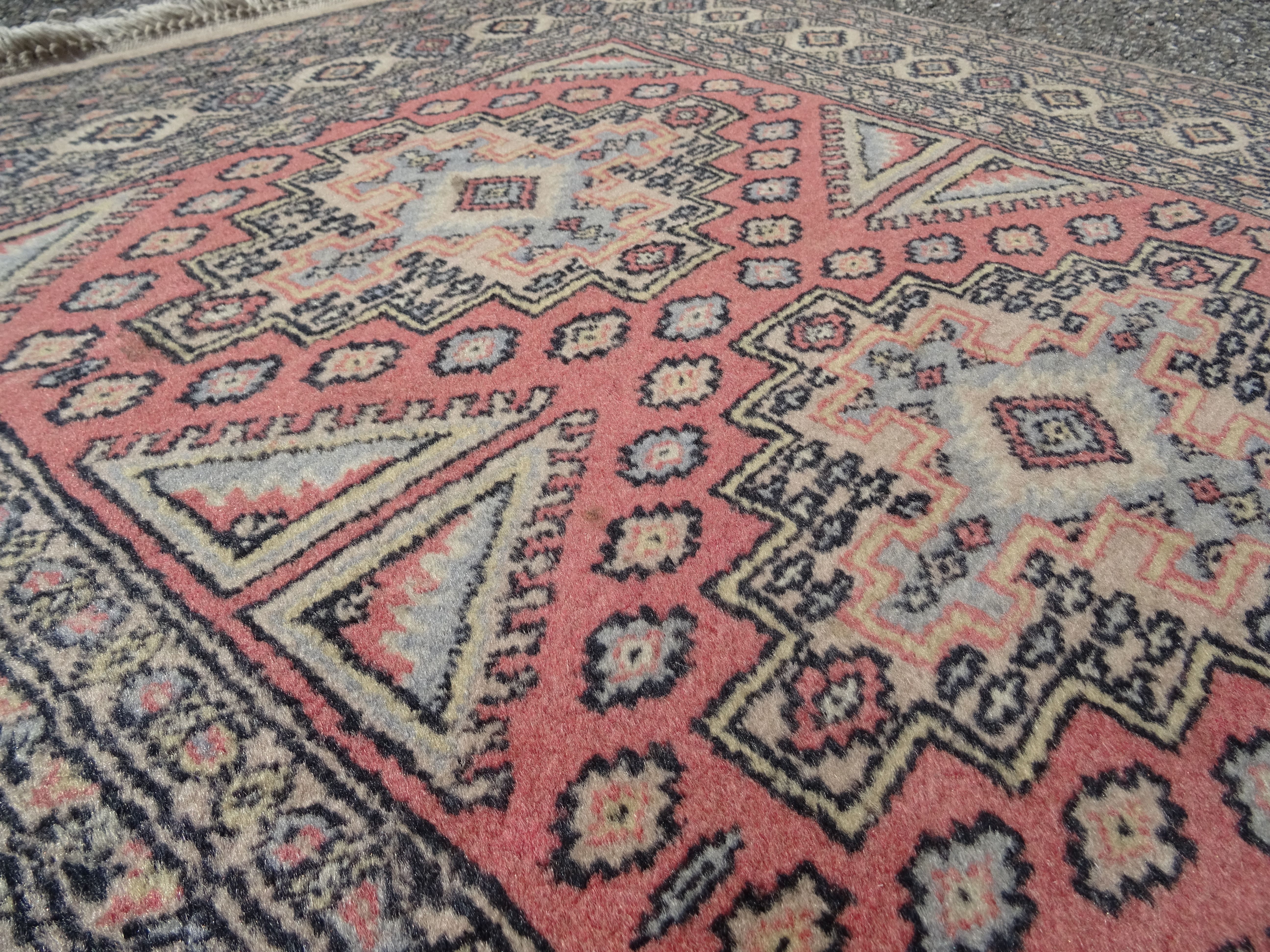 Pakistani carpet Bukhara handmade wool signed
