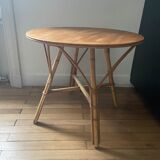 Round coffee table, in rattan and wood