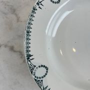 Set of 7 deep plates in earthenware, decorated with a green frieze.