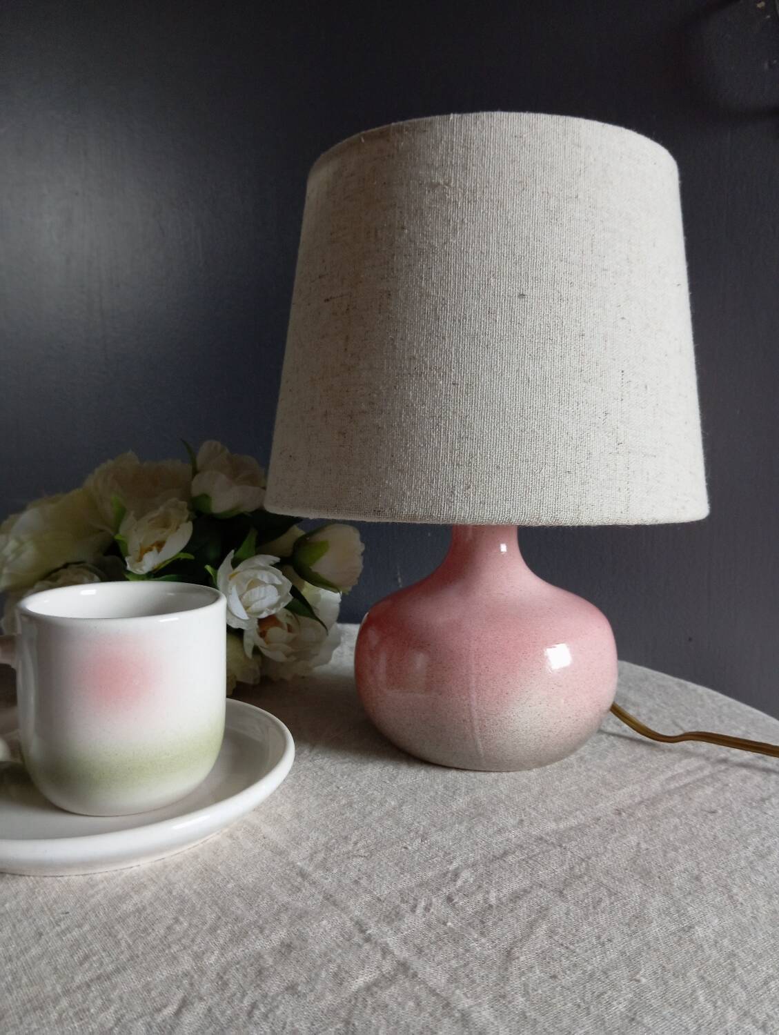 Signed speckled pink ceramic bedside lamp, linen lampshade