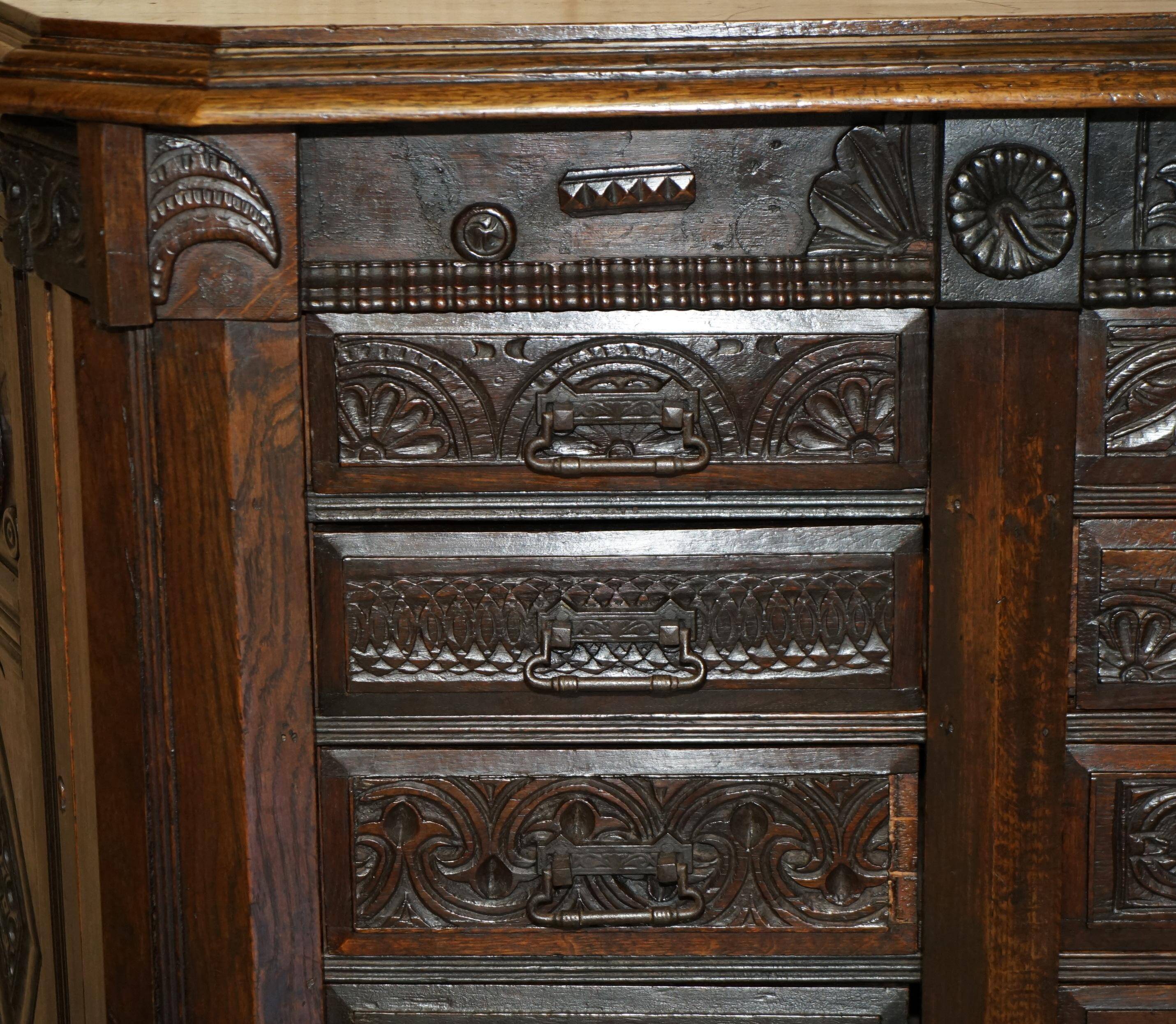 Hand-carved commode from 1685 with sideboards and side cupboards.