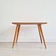 Antique coffee table with compass legs