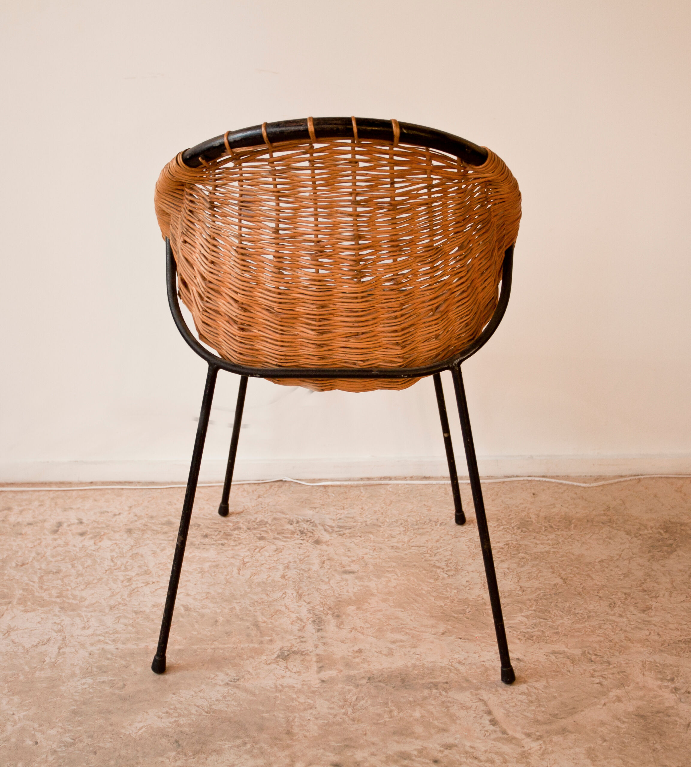 Wicker and metal armchair