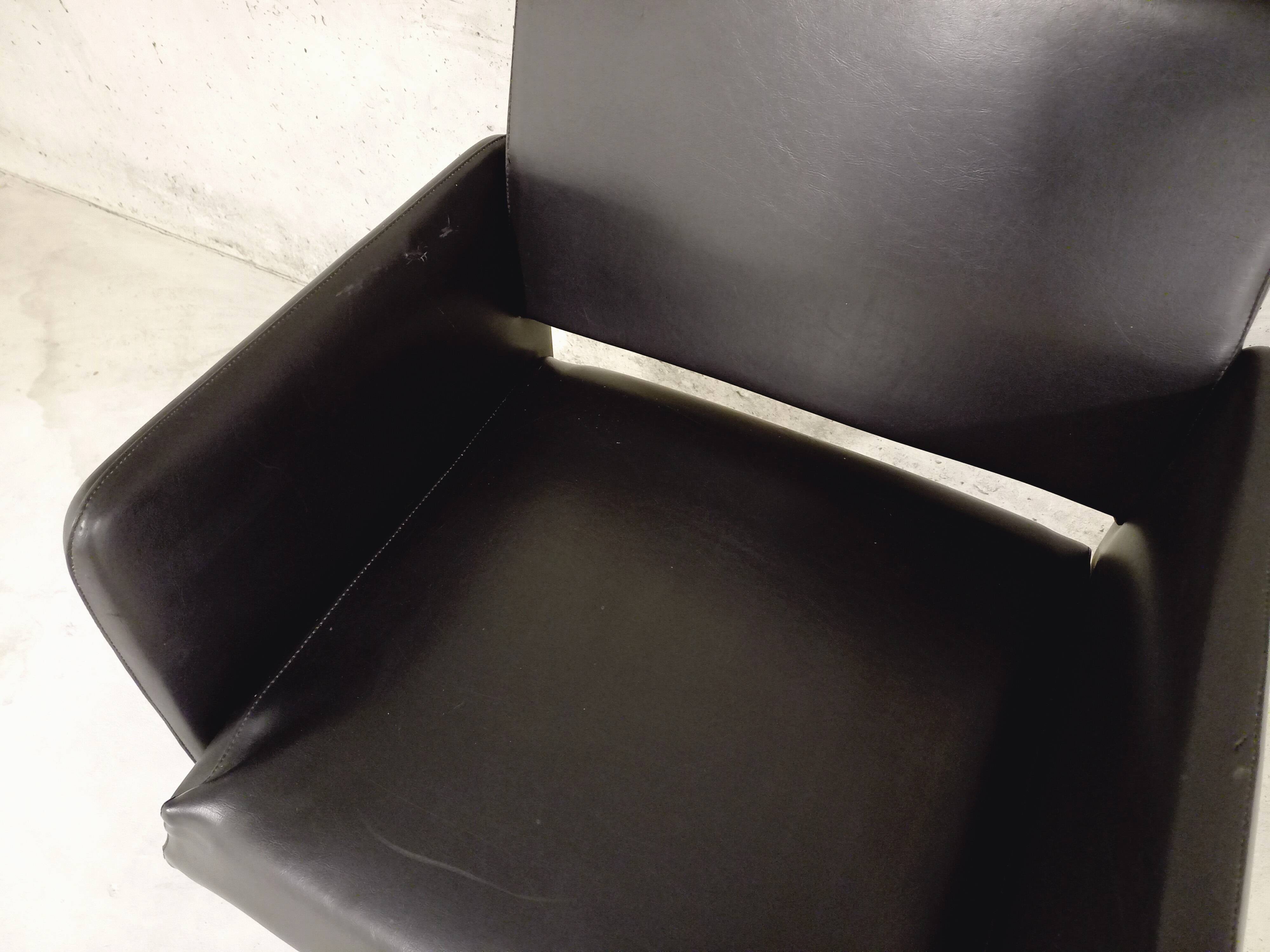 Vintage armchair in skai and black metal 60s