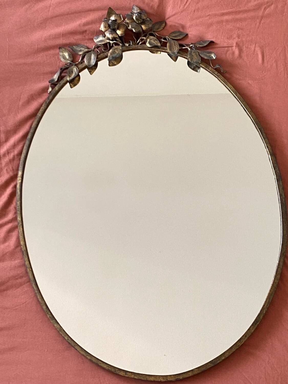 Old bronze frame mirror