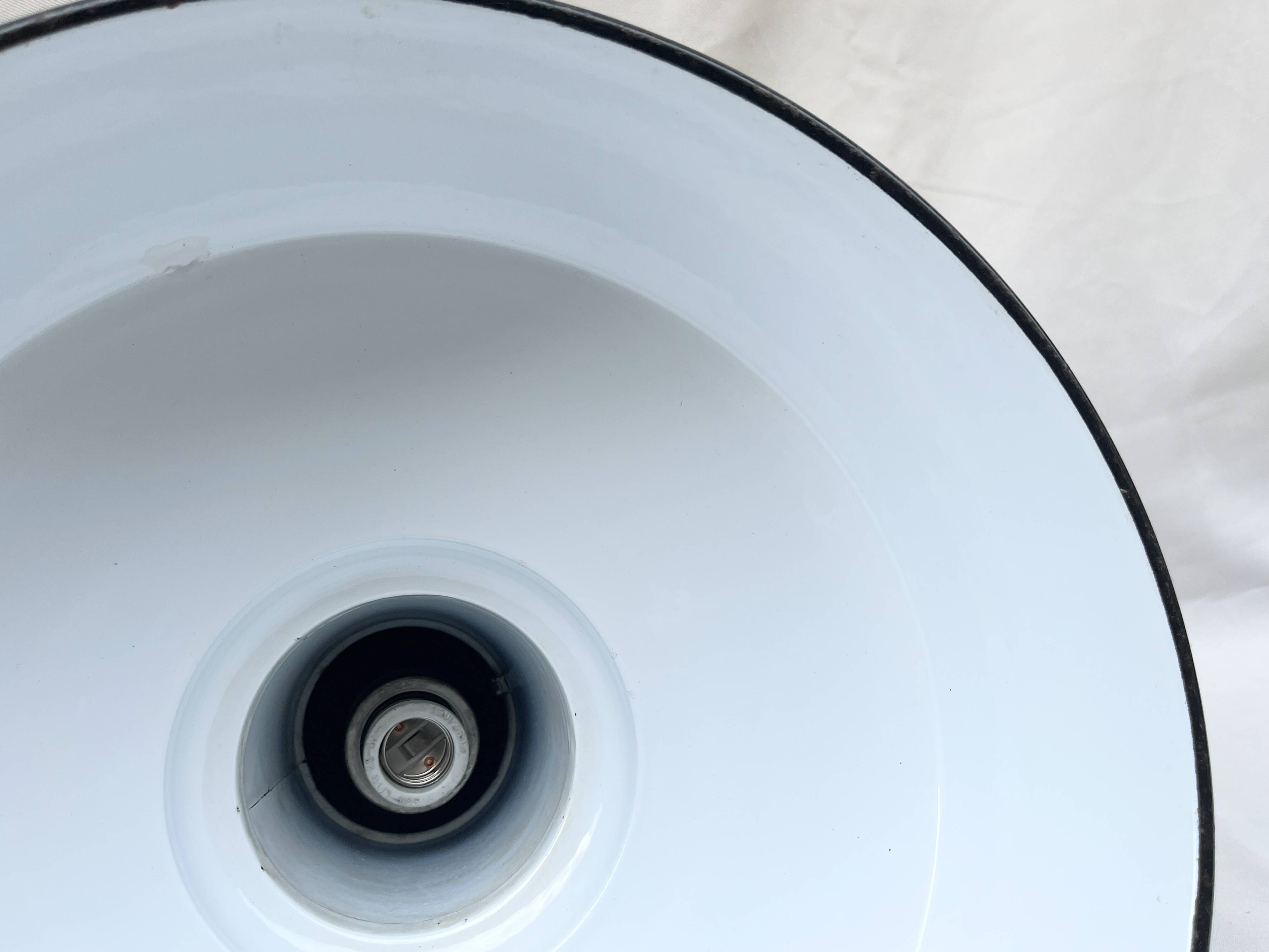 Industrial pendant light in black and white enamelled sheet metal factory bowl