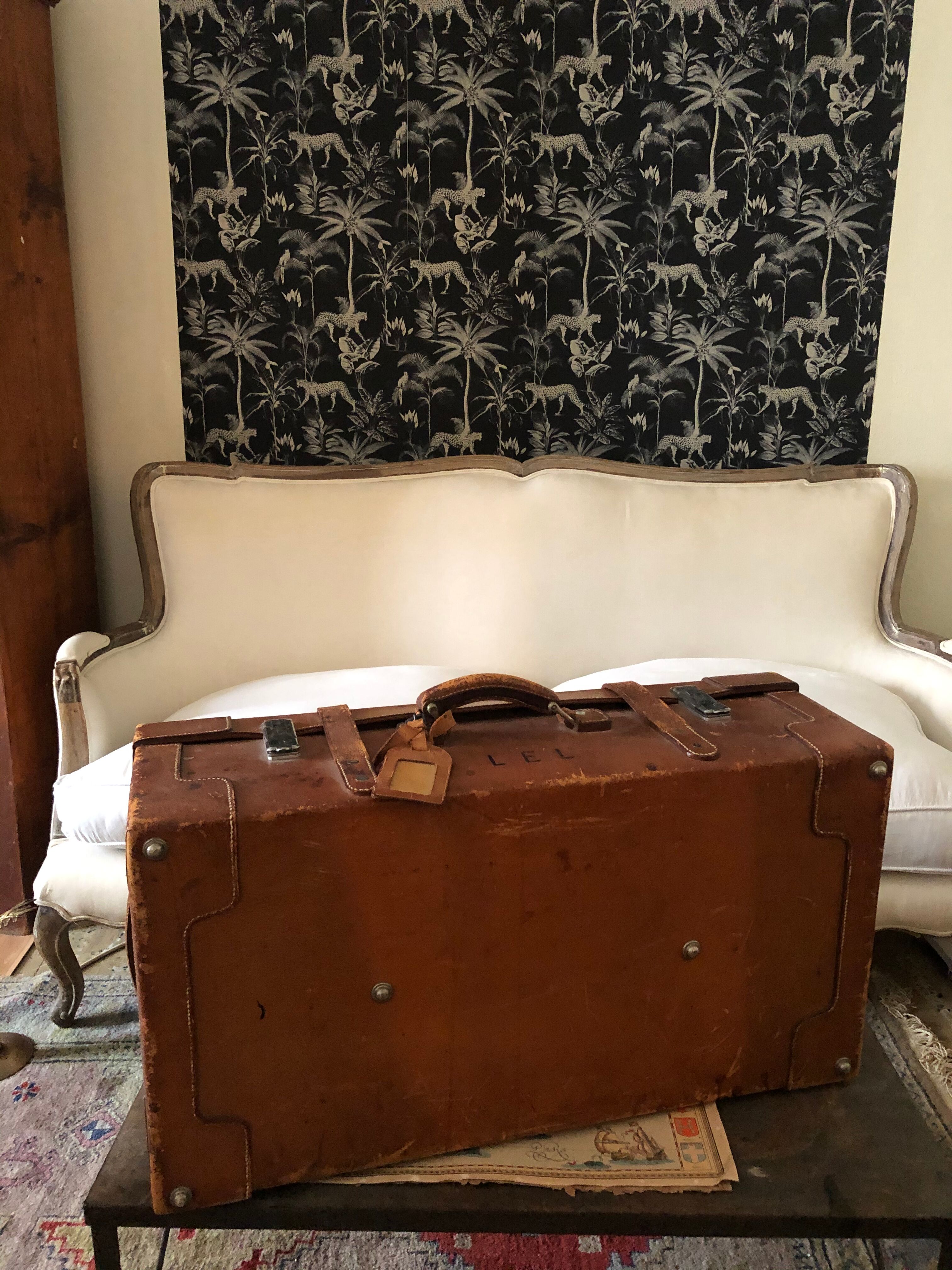 Former leather trunk with Louis Vuitton label holder