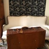 Former leather trunk with Louis Vuitton label holder