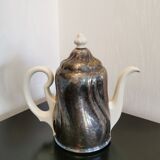 Silver-plated ceramic jug