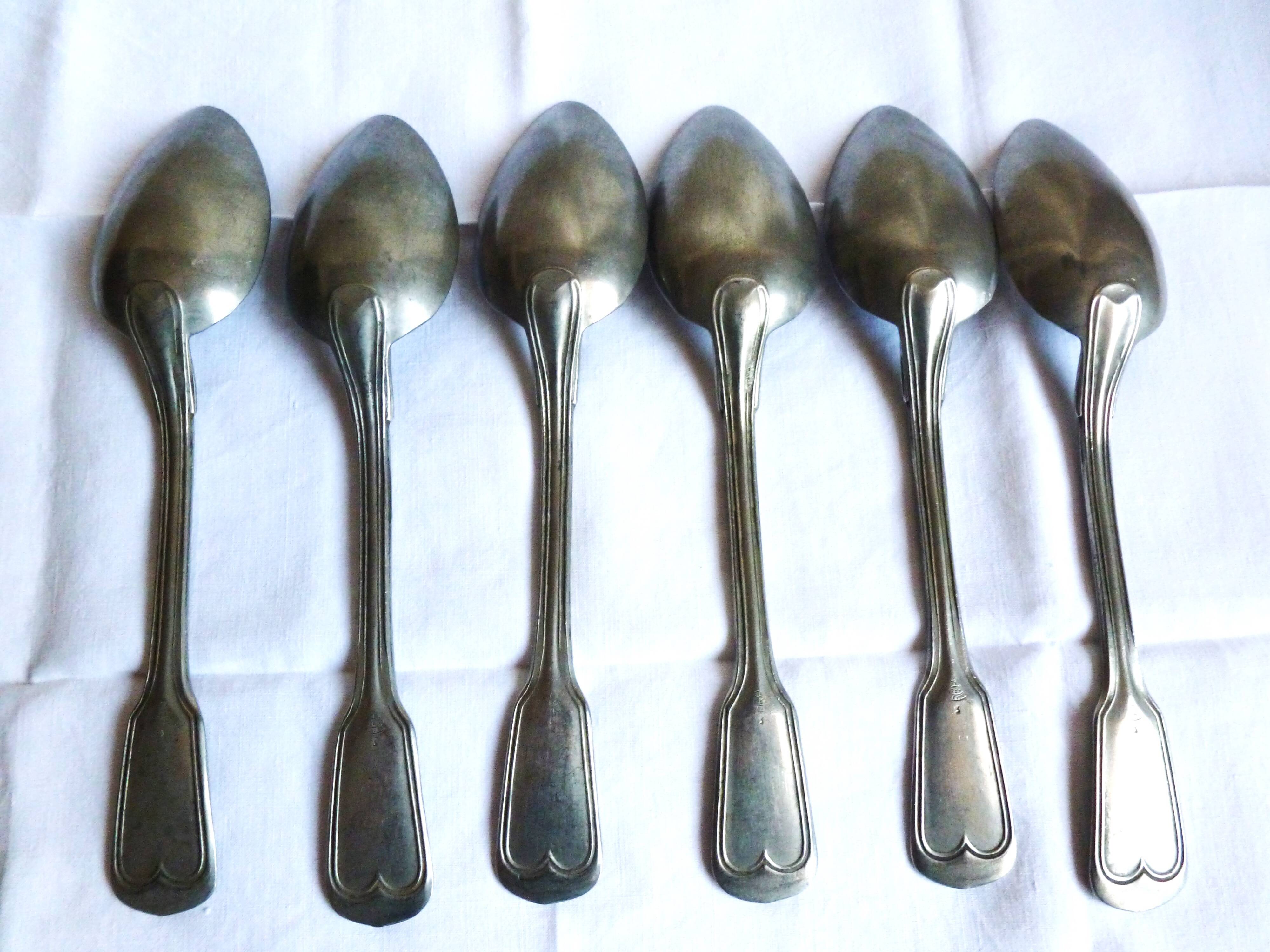 Art Deco cutlery, spoons, forks and table knives.