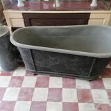 old bathtub with its stove