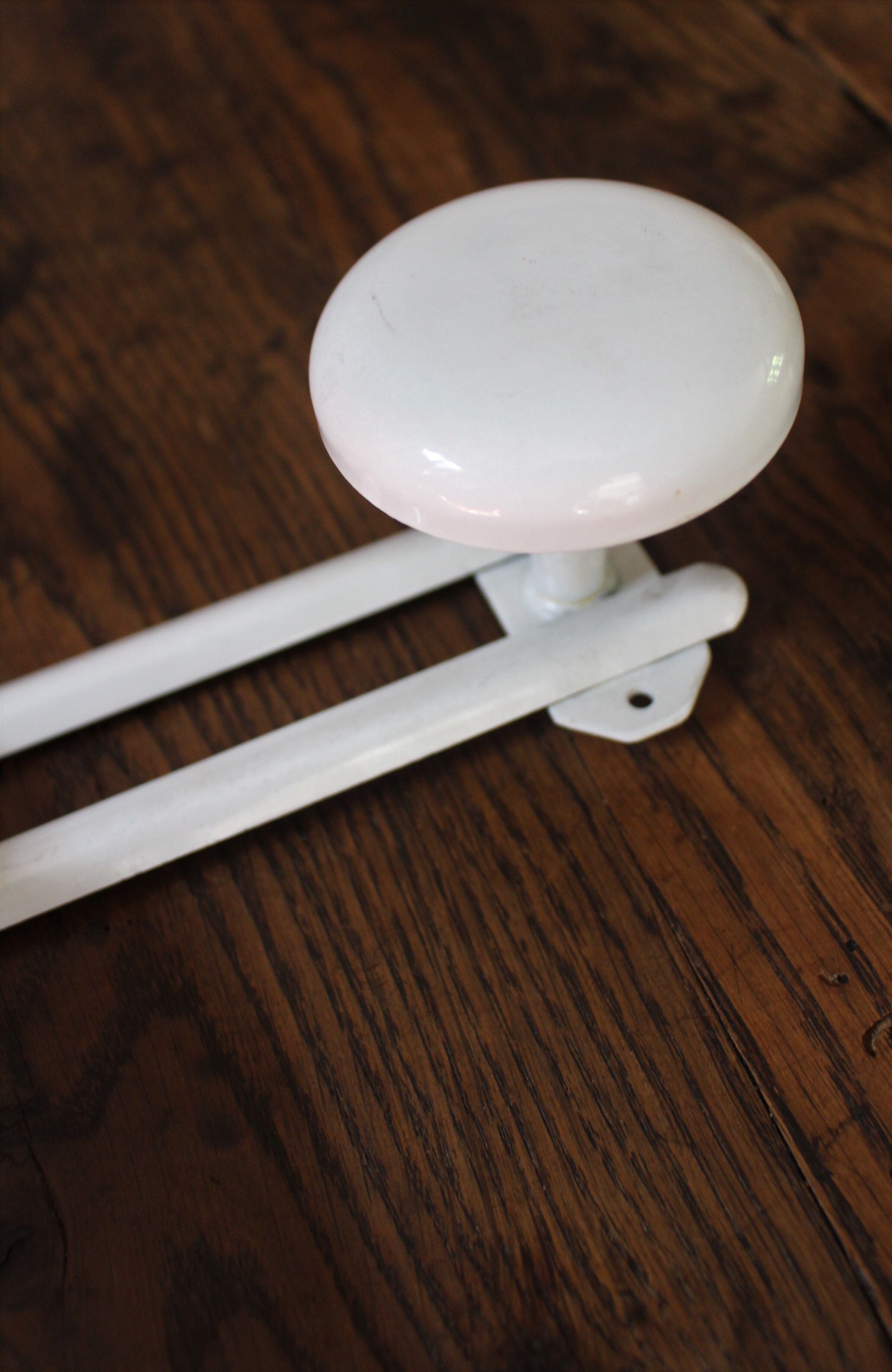 Vintage white metal coat rack with 2 hooks