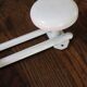 Vintage white metal coat rack with 2 hooks