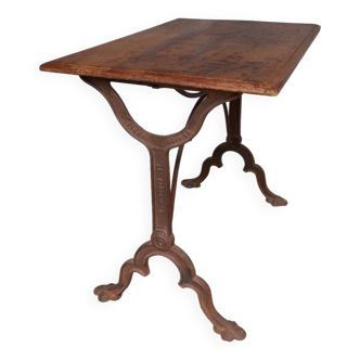 Antique bistro table with lion paws