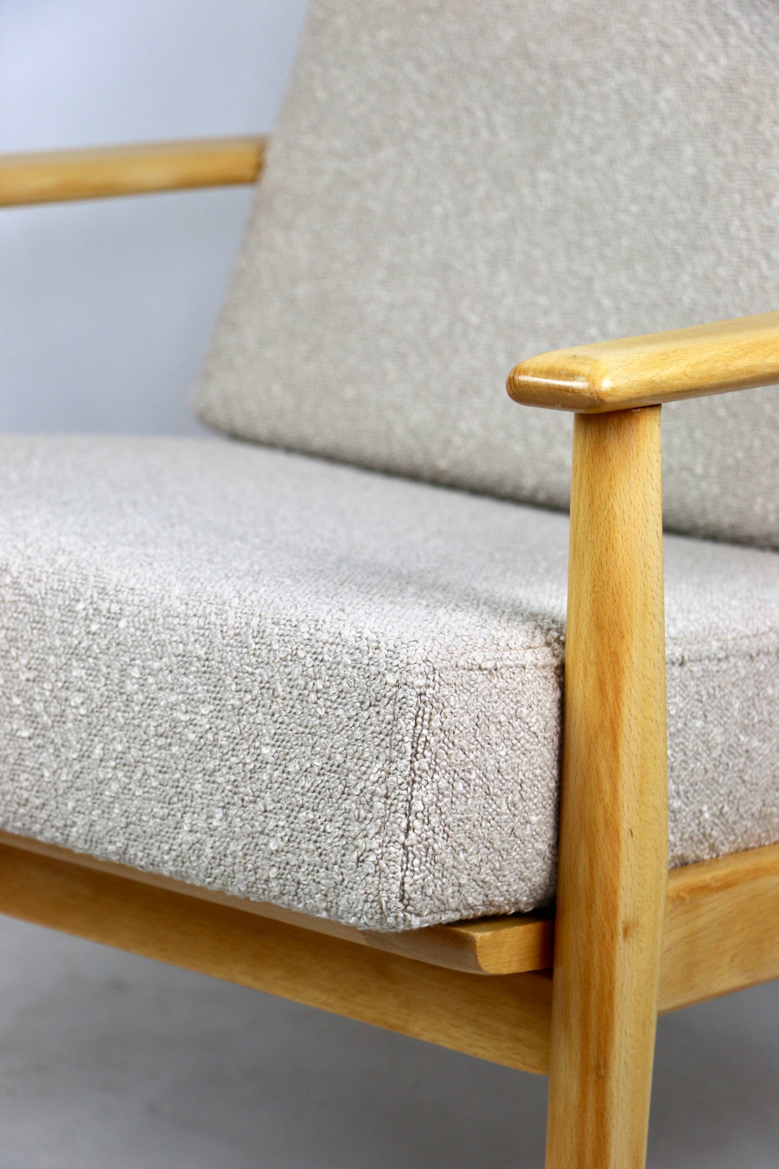 Vintage Danish armchair, 1970s, beige boucle - light wood - 2 pieces available
