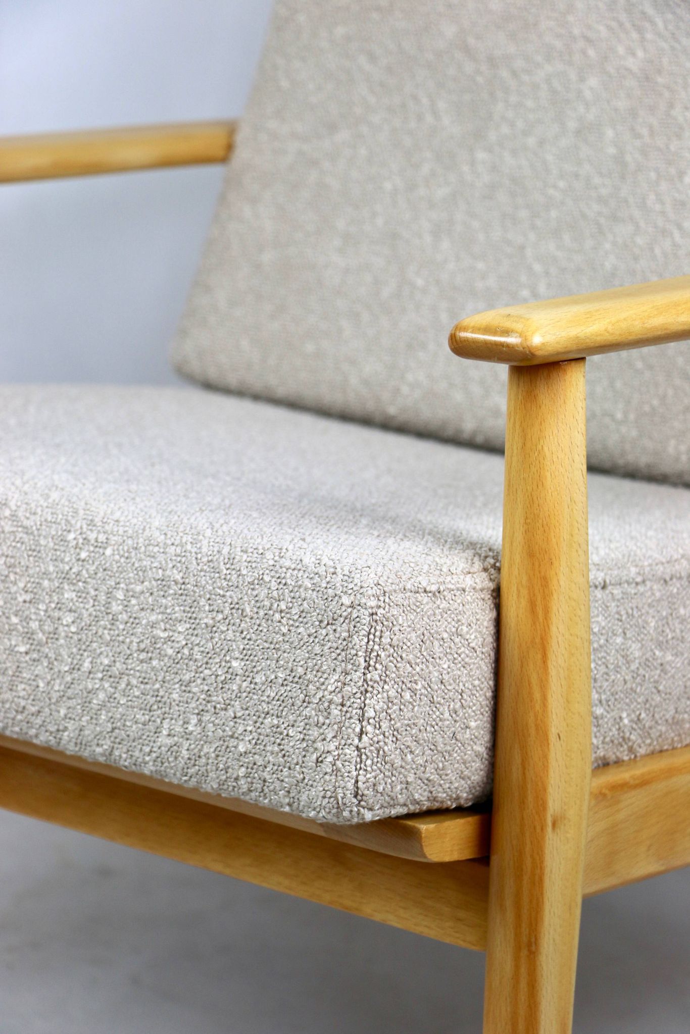 Vintage Danish armchair, 1970s, beige boucle - light wood - 2 pieces available