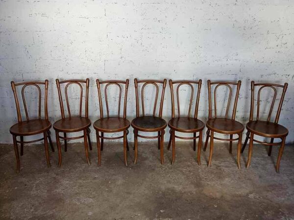 7 chaises bistrot pirogravées début XXème siècle Fischel Baumann Luterma