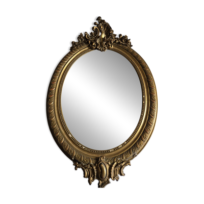 Miroir ancien ovale sryle louis 15 doré finition rocaille matiere stuc