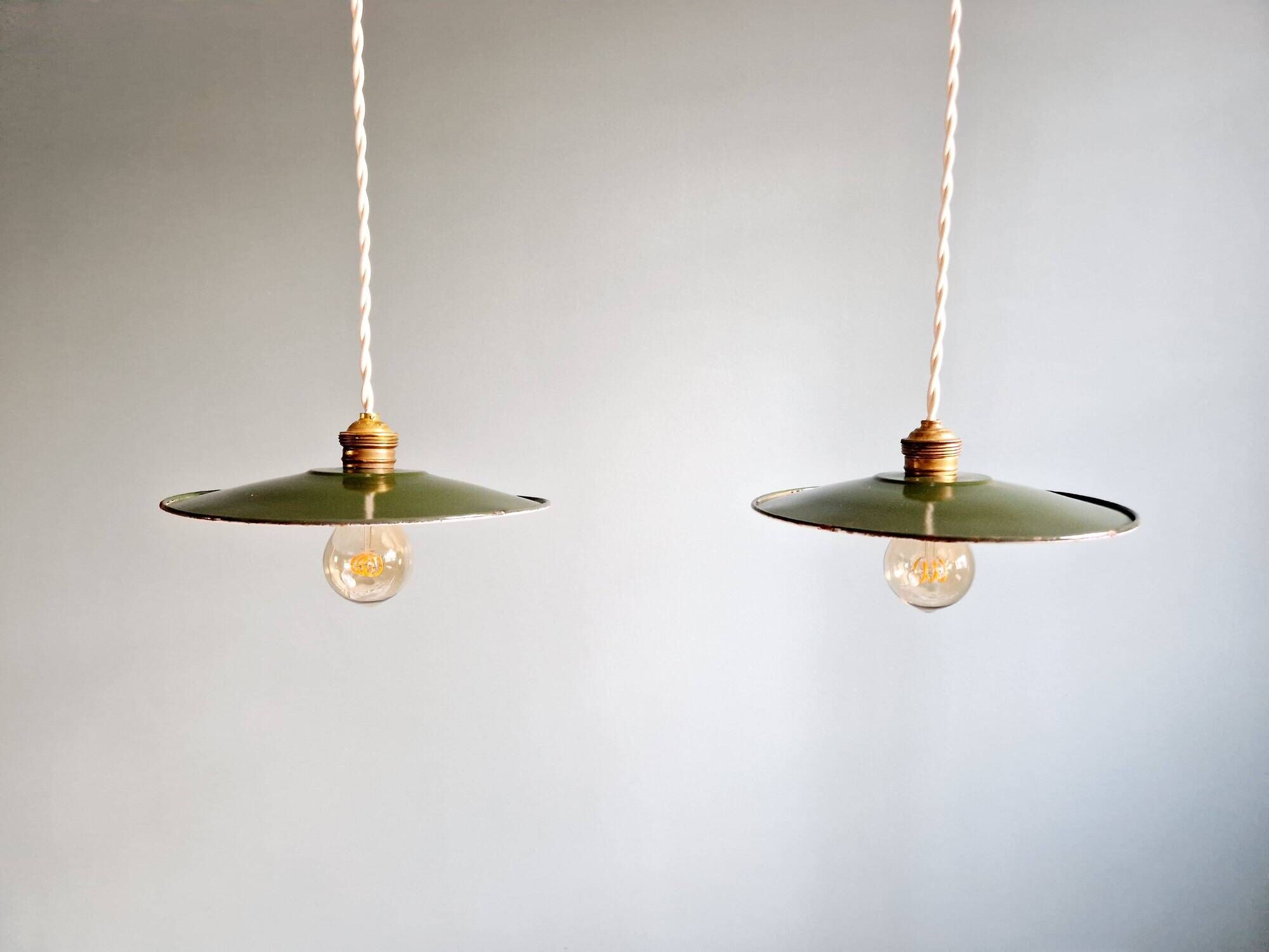 Pair of industrial pendant lights in green enamelled sheet metal