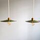 Pair of industrial pendant lights in green enamelled sheet metal